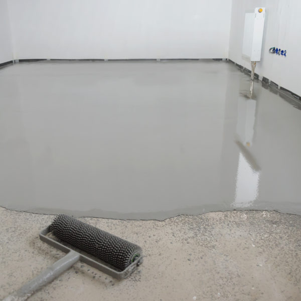 liquid screed being spread